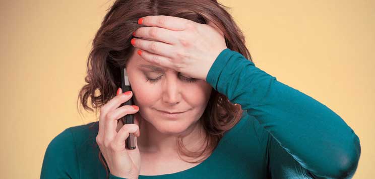 stressed out woman on phone