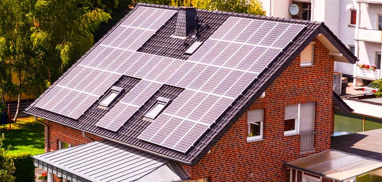 home with solar panels for home energy tax credits