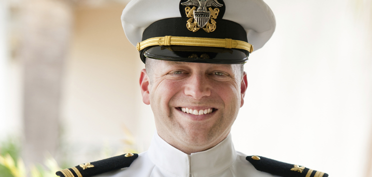Veteran in uniform smiling
