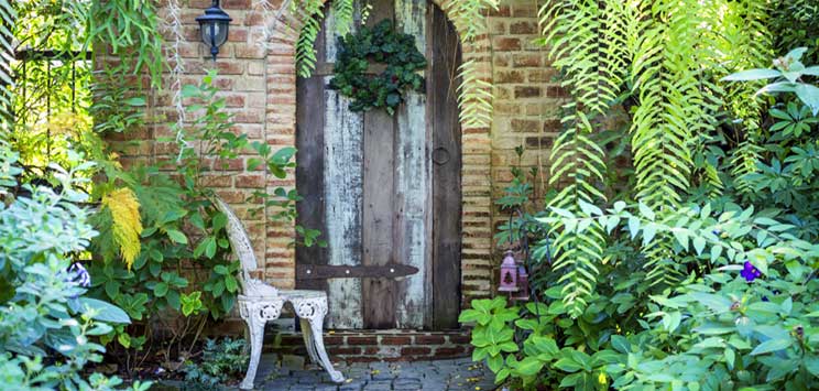 brick porch with foliage